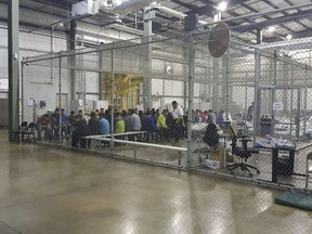 This U.S. Customs and Border Protection photo shows intake of illegal border crossers at the Central Processing Center in McAllen, Tex., on May 23, 2018.