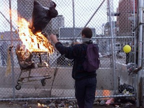 A Summit of the Americas protestor is seen in 2001.