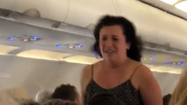 A video posted on Facebook shows an unnamed woman having a meltdown aboard a Spirit Airlines flight. (Facebook)