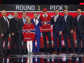 Centre Jesperi Kotkaniemi stands on stage after being selected by the Montreal Canadiens during the NHL Entry Draft in Dallas on June 22, 2018.