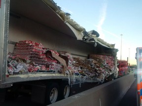 Police say cleanup efforts are underway after a transport truck collision that spilled yogurt onto a busy stretch of highway 401 in Toronto's east end.