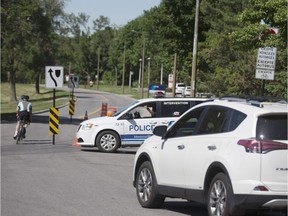 Police redirect vehicles on Saturday on Mount Royal.