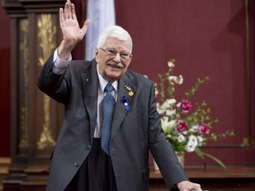 Former Quebec Education Minister Paul Gérin-Lajoie waves as he receives the George-Émile-Lapalme Award at a ceremony for Les Prix du Québec on Nov. 12, 2013, at the legislature in Quebec City.