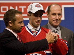 Canadiens the general manager Bob Gainey, right, and director of player recruitment and development Trevor Timmons chose Louis Leblanc 18th in the 2009 NHL Draft.