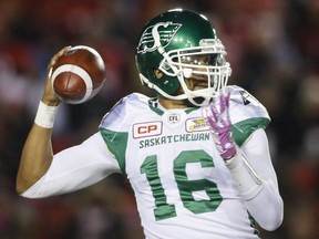 Saskatchewan Roughriders quarterback Brandon Bridge throws the ball during first half CFL football action against the Calgary Stampeders in Calgary, Friday, Oct. 20, 2017.