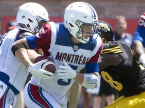 Alouettes quarterback Drew Willy runs the ball during first half preseason CFL football action against the Hamilton Tiger-Cats in Montreal on Saturday, June 9, 2018.
