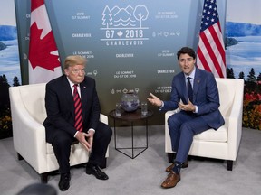 Prime Minister Justin Trudeau meets with U.S. President Donald Trump at the G7 leaders summit in La Malbaie on Friday, June 8, 2018.