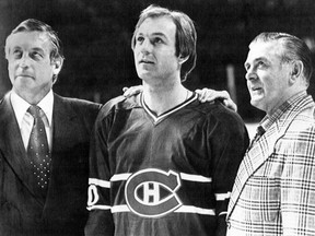 Three eras of the Canadiens were at the Montreal Forum. From left, Jean Béliveau (1950s and 1960s), Guy Lafleur (1970s) and Maurice "Rocket" Richard (1940s and 1950s).