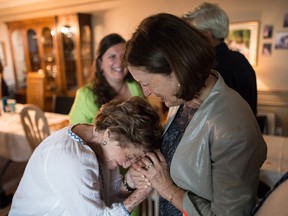 Rose Lipszyc, left, and Janina Zak-Krasucki embracing at a coming together of families at Rose's home, Toronto, Ont., June 9, 2018.