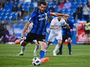 Montreal Impact midfielder Ignacio Piatti scores on a penalty kick against Orlando City SC during first half action in Montreal on Wednesday, June 13, 2018.
