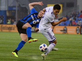 "There's no better time for a challenge like this,” Impact midfielder Samuel Piette, left, battling Orlando City’s Tony Rocha, says of facing Sporting KC on Saturday at Saputo Stadium.