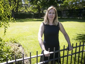 Susan Kohlhoss stands in disputed lot next to their Outremont house on Monday, June 11, 2018.
