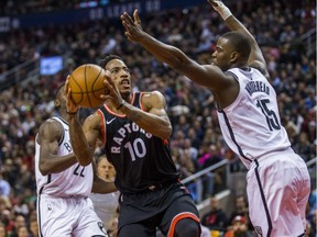Toronto Raptors DeMar DeRozan during 2nd half action against the Brooklyn Nets Isaiah Whitehead at the Air Canada Centre in Toronto, Ont. on Friday December 15, 2017. Ernest Doroszuk/Toronto Sun/Postmedia Network ORG XMIT: POS1712152109431702