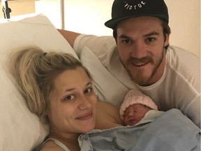 Andrew Shaw and his wife, Chaunette Boulerice, pose with their new baby girl named Andy in photo the Canadiens forward posted on Twitter on June 18, 2018. Credit: Andrew Shaw/Twitter