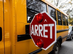 A school bus in Westmount: Many drivers ignore the stop signs and flashing lights.