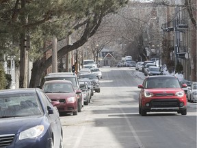 St-André St. in March: Work on sidewalks and Hydro poles has more to do with pedestrians and snow removal than a bike path, group representing demerged suburbs says.