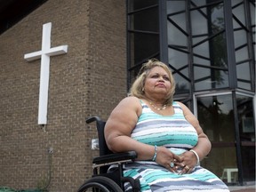 Lovie Rivard, pictured outside Saint David Church. She is upset that the English mass will be held elsewhere.