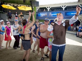 Quebec Singer Joël Denis leads dancers on a conga line at the Beachclub, in Pointe-Calumet, north of Montreal on Thursday, July 5, 2018. Close to 500 active seniors over the age of 70 from 27 Chartwell residences in Quebec and Ontario headed to the club for a day under the sun, making it the biggest seniors' gathering of its kind in the province.
