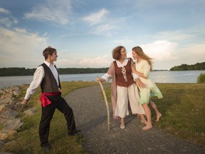 Diana Gaudsen, holding stick, is Prospera, Sophie McCafferty is Miranda and Patrick Gareau is Ferdinand in the Hudson Players Club production of Shakespeare's The Tempest.