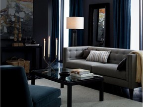 Deep grey, blue and teal decor helps visually cool down a room and makes a large space feel more intimate.