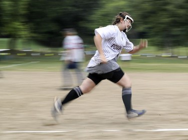 Casey McCormick runs to first base during exhibition softball game between local players and Expos Nation at Jeanne Mance Park in Montreal Saturday July 14, 2018.  The event was held in response to the Plateau Mont-Royal's decision to close the north softball field in the same park.  (John Mahoney / MONTREAL GAZETTE) ORG XMIT: 61056 - 0468
