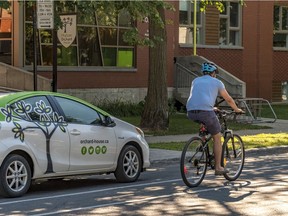 The layout of Grand Blvd. makes it difficult for drivers to see oncoming cyclists, according to Yasmine Ghandour, the general director of the Orchard House daycare centre. Parents parked in front of the daycare can't see cyclists until their cars have pulled out onto the bike lane.