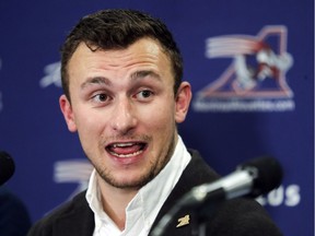 Newly-acquired Alouettes quarterback Johnny Manziel answers questions at a press conference after his first practice with the team after being acquired in a trade from Hamilton, at the Olympic Stadium in Montreal Monday July 23, 2018. (John Mahoney / MONTREAL GAZETTE) ORG XMIT: 61105 - 7417
