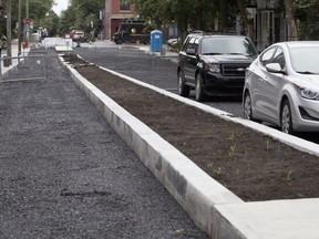 A new protected bicycle path being built on Clark St. in the Plateau-Mont-Royal borough is too wide to allow cars to park on both sides of the street, and the problem will be corrected, the city says.