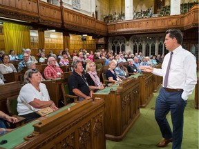 Vaudreuil-Soulanges MP Peter Scheifke speaks with seniors visiting Ottawa on July 18.