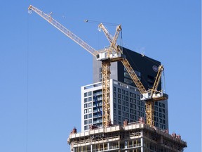 Construction of the second phase of the residential project Tour des Canadiens is seen Thursday, October 12, 2017 in Montreal. Although tame by Toronto and Vancouver standards, developers in Canada's second-largest city are investing billions of dollars in new condominium and office complexes, along with retrofitting older buildings.