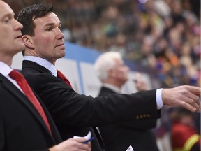 Team Canada head coach Luke Richardson gestures during the game against Dinamo at the 90th Spengler Cup hockey tournament in Davos, Switzerland, on Dec. 26, 2016.