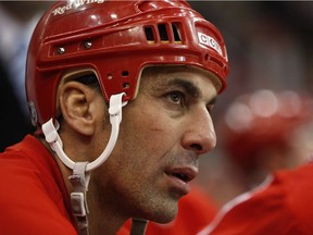 Chris Chelios of the Detroit Red Wings looks on from the bench during NHL game against the Phoenix Coyotes on Dec. 1, 2007 at the Joe Louis Arena in Detroit.