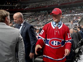 Jordan Harris reacts after being selected 71st overall by the Montreal Canadiens during the 2018 NHL Draft at American Airlines Center on June 23, 2018, in Dallas.