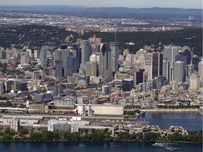MONTREAL, QUE.: JULY 19, 2018-- The skyline of Montreal is seen in an aerial view in Montreal on Thursday July 19, 2018. (Allen McInnis / MONTREAL GAZETTE) ORG XMIT: 61081