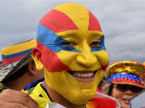 Colombia's supporter pose before the Russia 2018 World Cup round of 16 football match between Colombia and England at the Spartak Stadium in Moscow on July 3, 2018.
