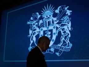 Dr. Granger Avery is silhouetted as he walks on stage to be installed as the new president of the Canadian Medical Association during the association's General Council 2016, in Vancouver, B.C., on Wednesday August 24, 2016.