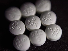 An arrangement of pills of the opioid oxycodone-acetaminophen, also known as Percocet, are shown in New York on August 15, 2017.