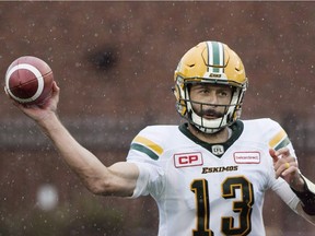 Edmonton Eskimos quarterback Mike Reilly throws a pass during first half CFL football action against the Montreal Alouettes in Montreal, Monday, October 9, 2017.