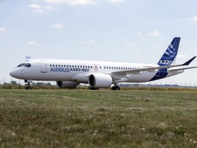 An Airbus A220 taxis at Toulouse-Blagnac airport in southwestern France, Tuesday, July 10, 2018. The Airbus aircraft were formerly Bombardier C Series planes.