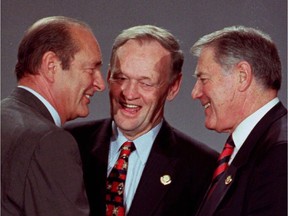 French President Jacques Chirac, left, shares a laugh with Canadian Prime Minister Jean Chretien, centre, and New Brunswick Premier Raymond Frenette at the conclusion of the Francophonie summit in Hanoi, Vietnam, on Nov. 16, 1997. The 28th premier of New Brunswick has died, according to a press release issued Saturday by the provincial government. Ray Frenette represented the Moncton East riding as a Liberal MLA for 25 years and briefly served as premier between 1997 and 1998, after Frank McKenna stepped down and before Camille Theriault took the post.THE CANADIAN PRESS/Fred Chartrand ORG XMIT: CPT106