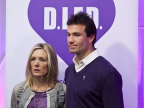 Ottawa Senators assistant coach Luke Richardson and his wife Stephanie pause near a banner prior to a news conference. Luke spoke publicly for the first time about the death of his daughter Daron, who took her own life in November 2010 at the age of fourteen. The Do It For Daron (D.I.F.D.) Youth Mental Health Awareness initiiative was launched to raise awareness and fundraising to inspire conversations about youth mental health. Wednesday Feb. 2, 2011.