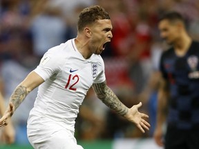 England's Kieran Trippier celebrates after scoring the opening goal during the semifinal match between Croatia and England at the 2018 soccer World Cup in the Luzhniki Stadium in Moscow, Russia, Wednesday, July 11, 2018.