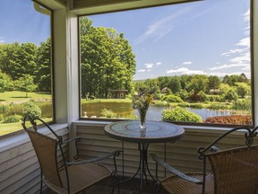 A beautiful view of the main pond can be had from the sunroom where Mike Stone and Susan Wallet like to take their breakfast.