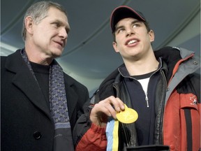 Blair Mackasey, left, and Sidney Crosby are seen in Montreal in 2004 after Team Canada defeated Russia to win the gold medal in world junior hockey tournament.