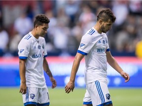 Montreal Impact's Saphir Taider, right, and Jeisson Vargas walk off the field after losing to the Vancouver Whitecaps during semifinal Canadian Championship soccer action in Vancouver on Wednesday, July 25, 2018.