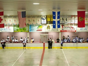 Junior Lacrosse teams, Extreme de Sherbrooke (L) and the Montreal Nationals (R) at Dorval Arena in 2012.