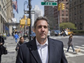 In this April 11, 2018, file photo, attorney Michael Cohen walks down the sidewalk in New York. Cohen is President Donald Trump's longtime personal lawyer.