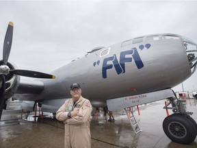 Pilot Allen Benzing poses next to FIFI, a Boeing B-29 Superfortress at St-Hubert airport on Sunday, July 22, 2018.