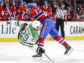 Canadiens forward Nicolas Deslauriers, checking Dallas Stars' Greg Pateryn in Montreal on March 13, 2018, led  led the team with 238 hits in 2017-18.