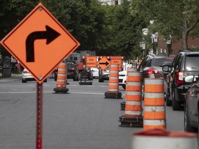 Work cones line Docteur-Penfield near Drummond on Thursday August 2, 2018.